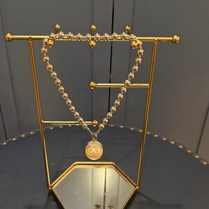 Elegant Gold and Silver Necklace